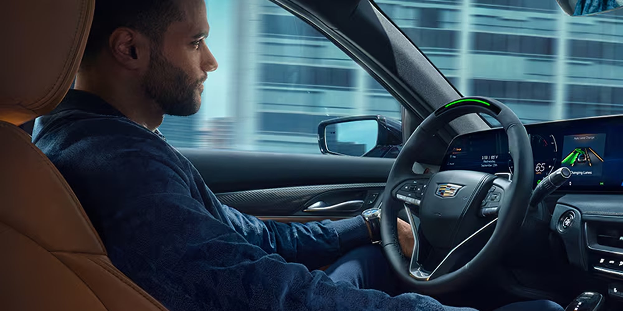 The Cadillac CT5 being driven handsfree with GM SuperCruise.