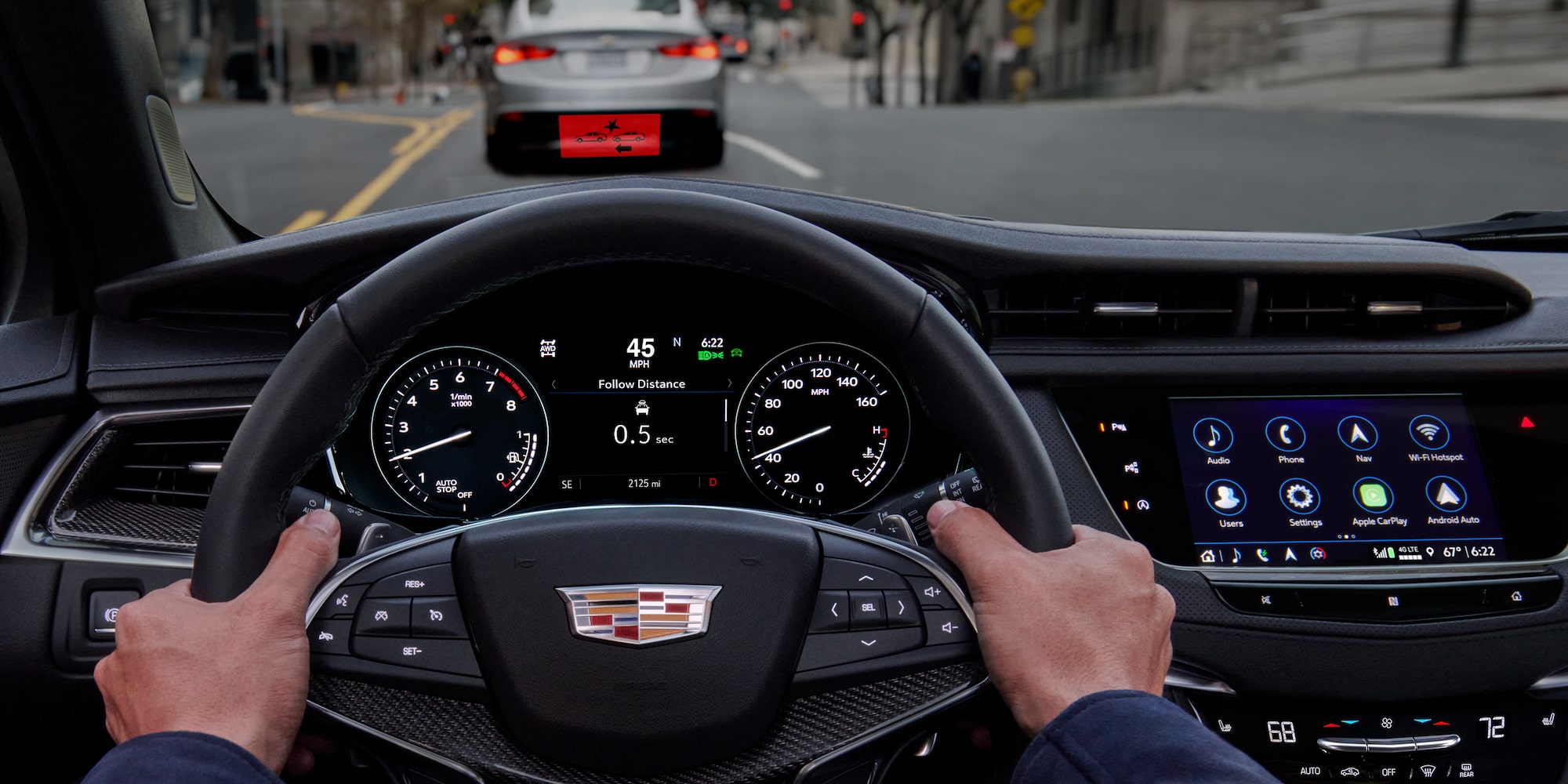 The steering wheel and dashboard of the Cadillac CT5.