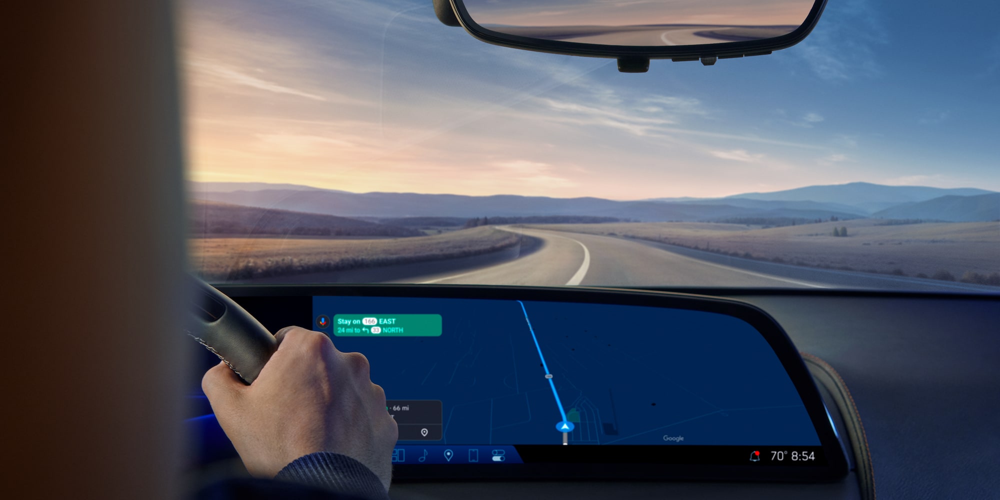 The infotainment system and windshield of the Cadillac CT5.