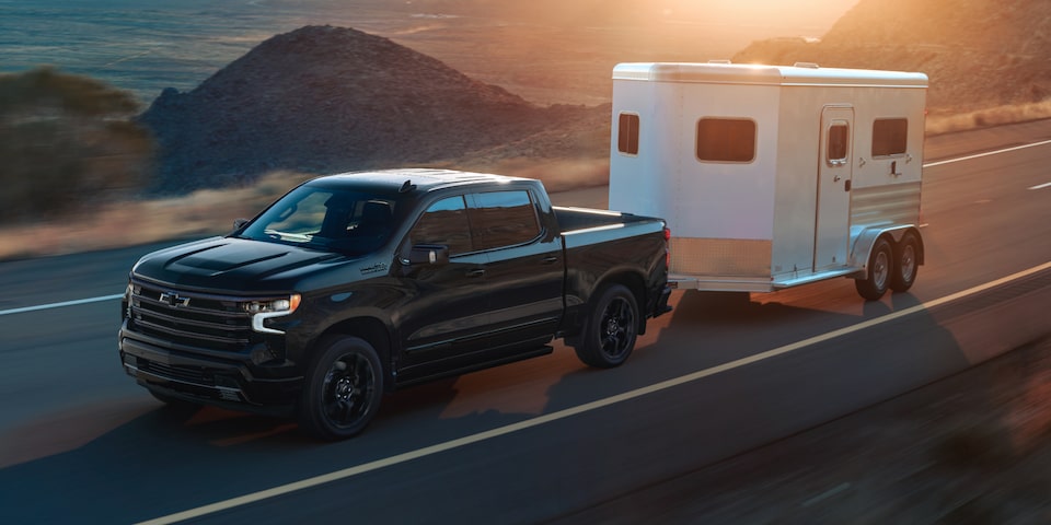 A 2026 Silverado HD pulling a horse trailer