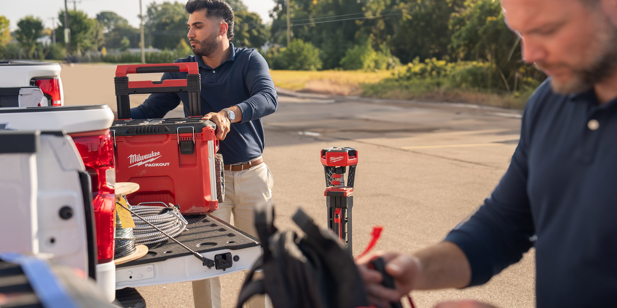 A white 2026 Chevrolet Silverado EV viewed from the rear