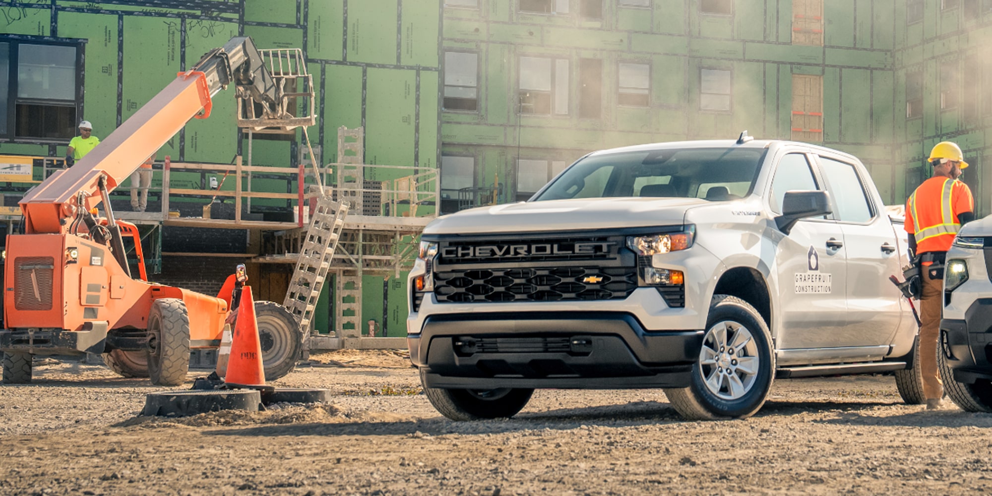 A white 2026 Chevrolet Silverado EV viewed from the rear