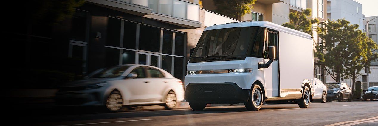 2025 Chevrolet BrightDrop driving down a city street