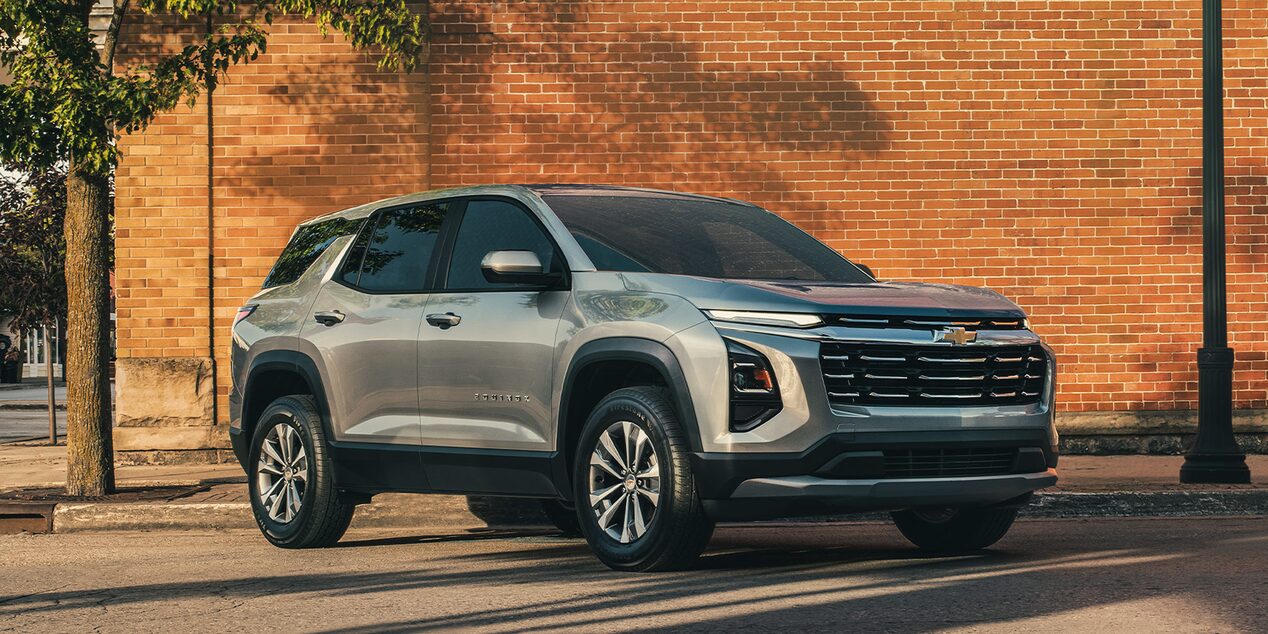 A Chevrolet Equinox parked in a city.