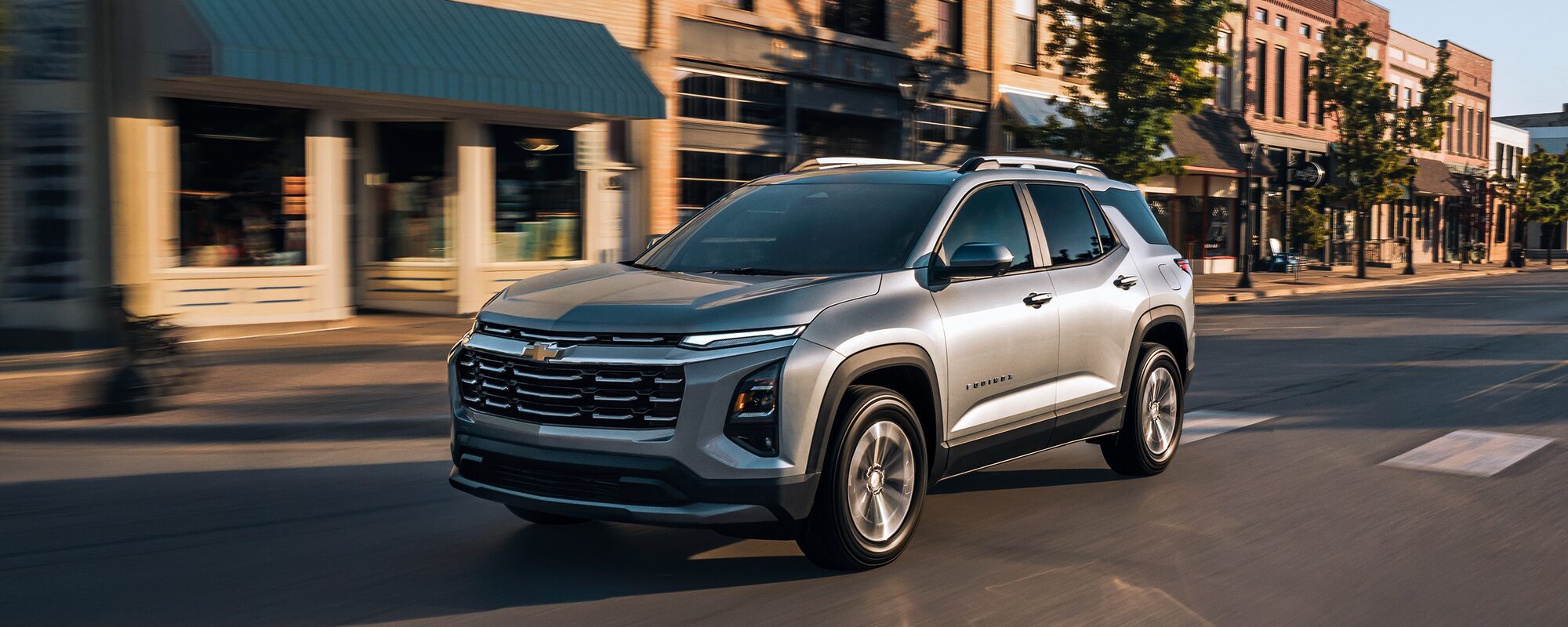 A Chevrolet Equinox driving down a road.