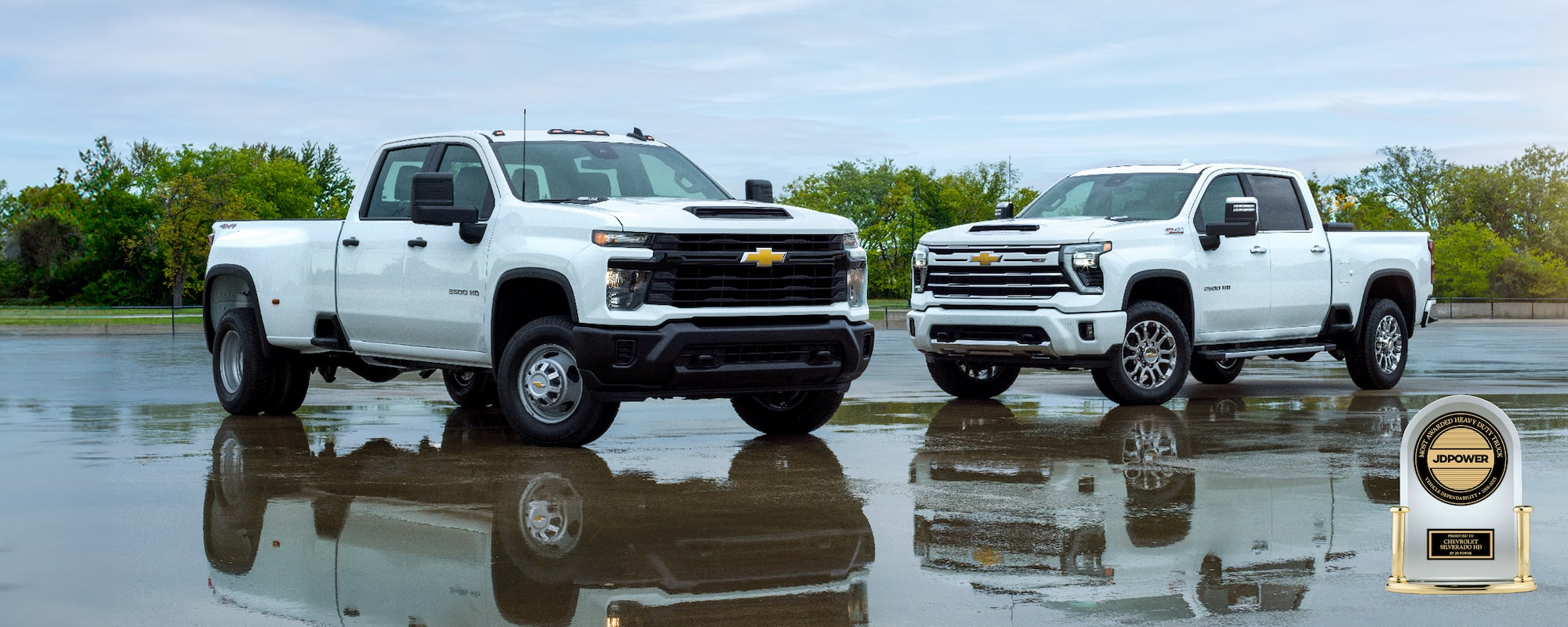 Two Chevrolet Silverado's parked with a JD Power Award in the bottom right corner.