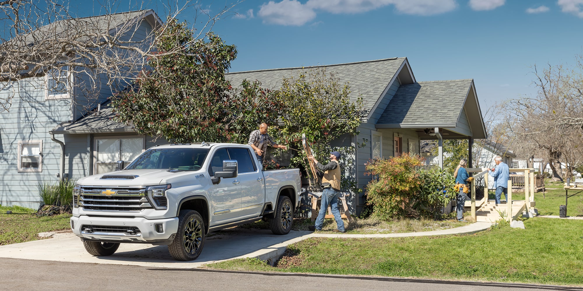 A 2026 Chevrolet Silverado parked outside a home