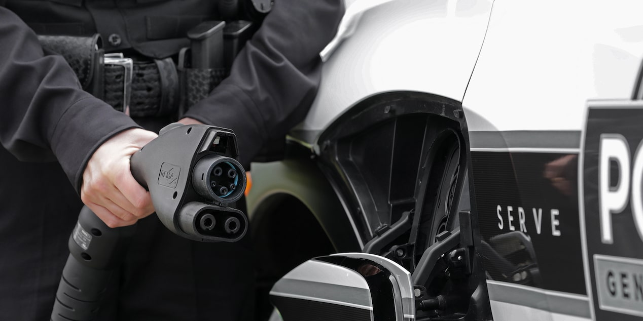 An officer charging their 2026 Blazer EV PPV