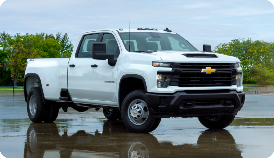 A Chevrolet Silverado in three-quarters view in a parking lot