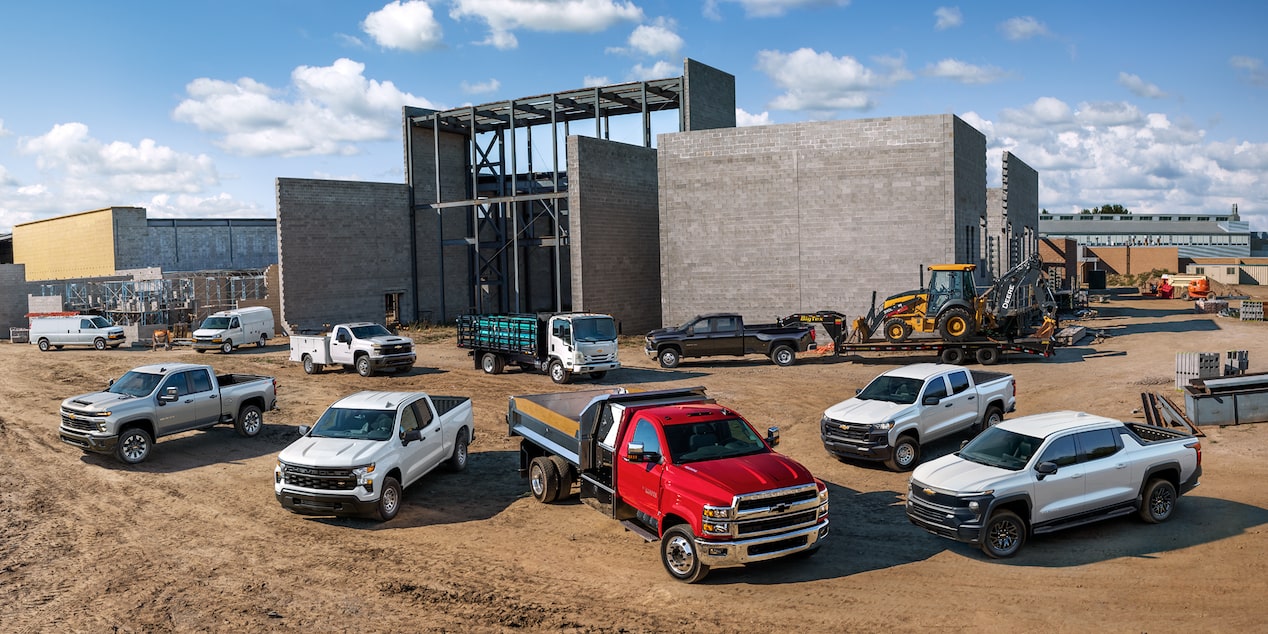A fleet of GM Vehicles on a construction site.