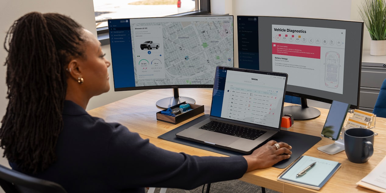 An office worker using GM Fleet OnStar Fleet Telematics.