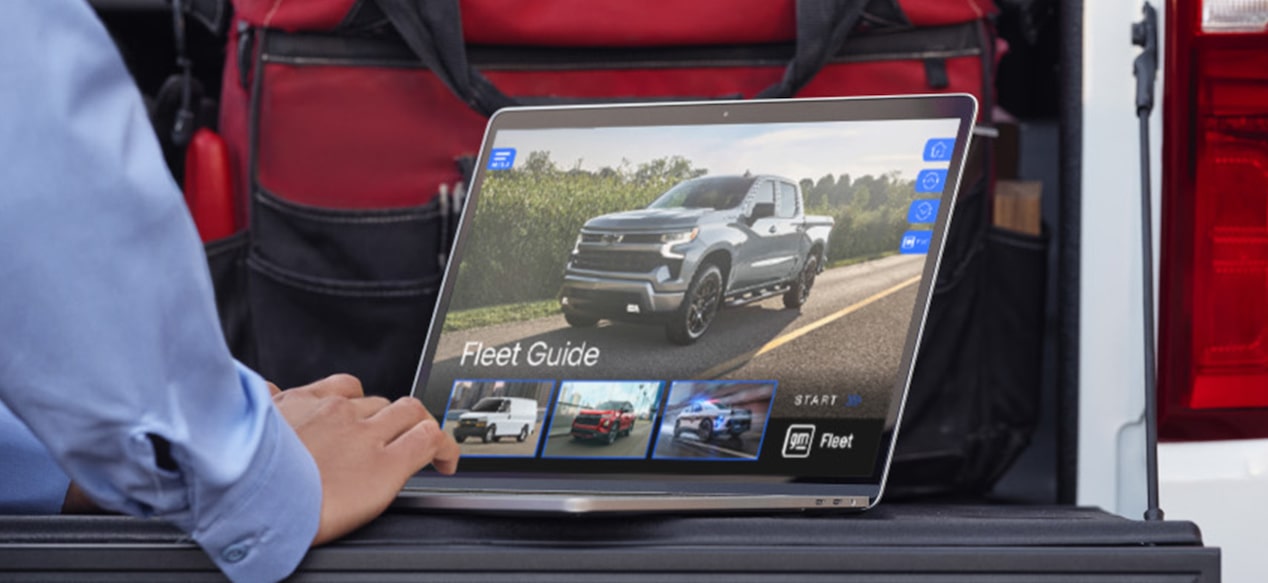a computer showing a vehicle manual