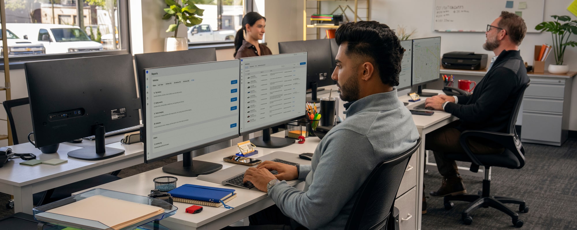 Office workers using GM One Fleet