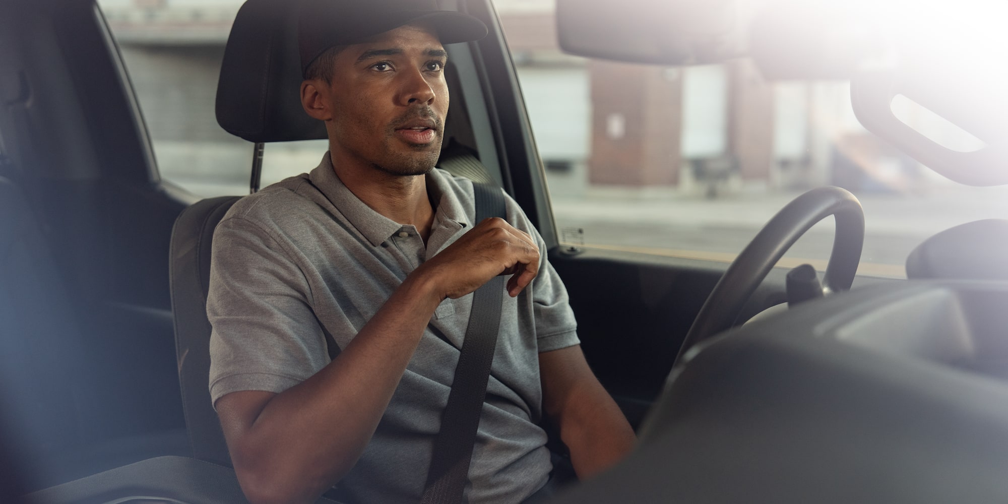 A driver sitting in their Chevrolet Blazer