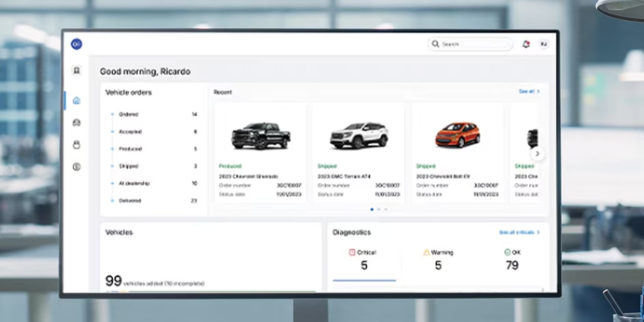 A Laptop With an Image of a Man Driving a Vehicle