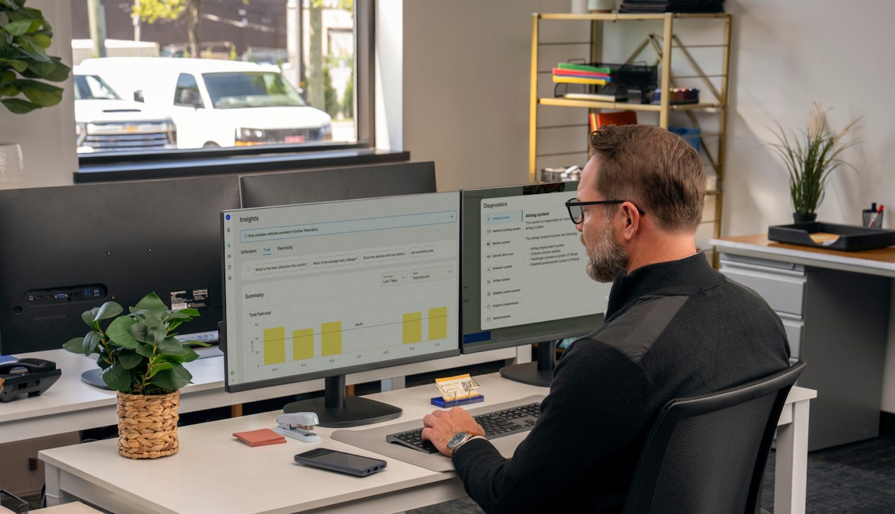 An office worker using GM Fleet telematics