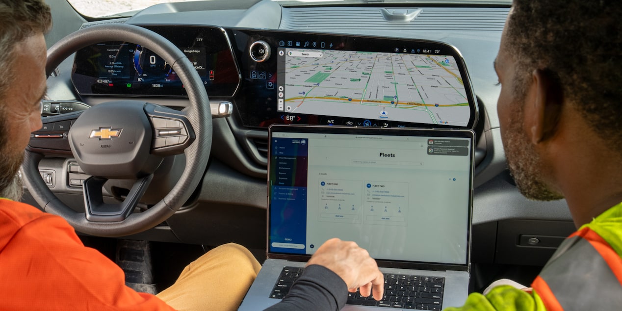 Two construction workers using GM Fleet telematics