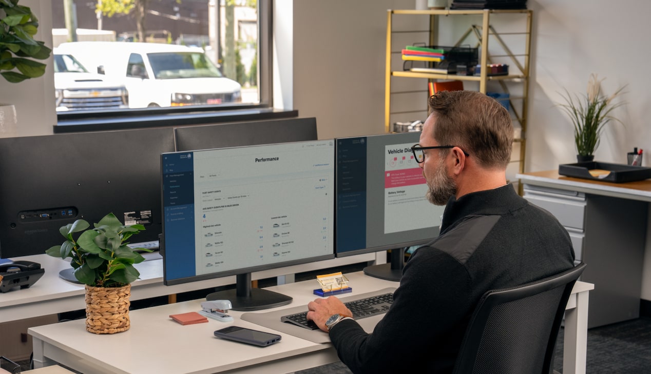 An office worker using GM Fleet telematics