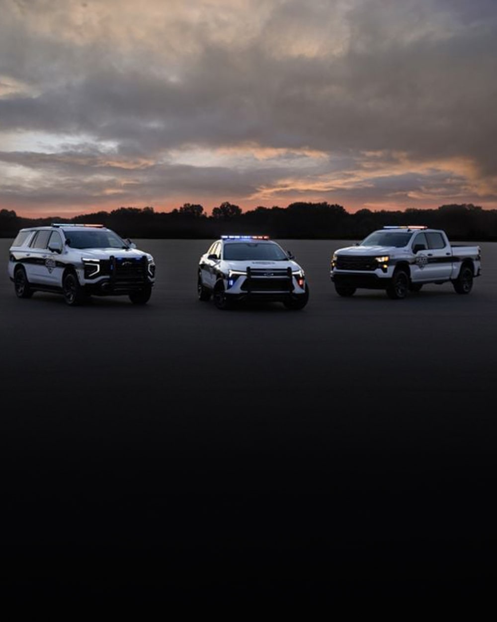 Three Chevrolet PPVs parked in a lot. 