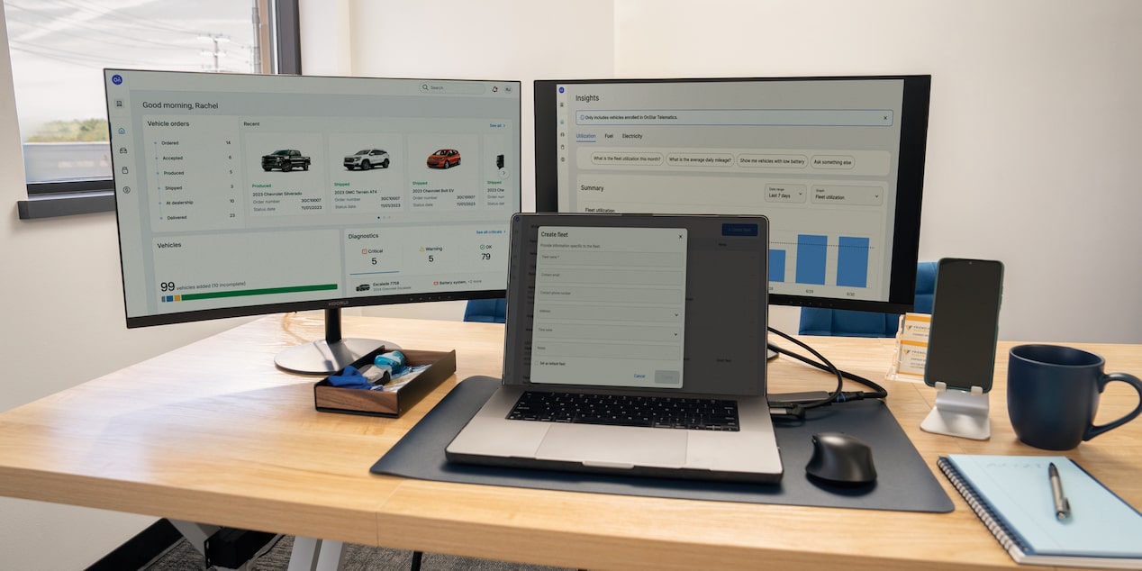 GM One Fleet on two monitors and a laptop